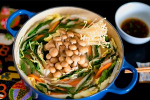 Japanese hotpot with soy sauce and chopsticks on the side