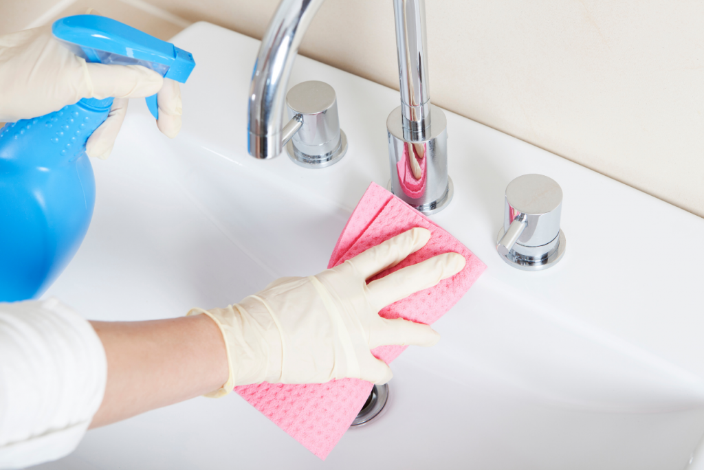 Cleaning toilet sink faucet and countertop