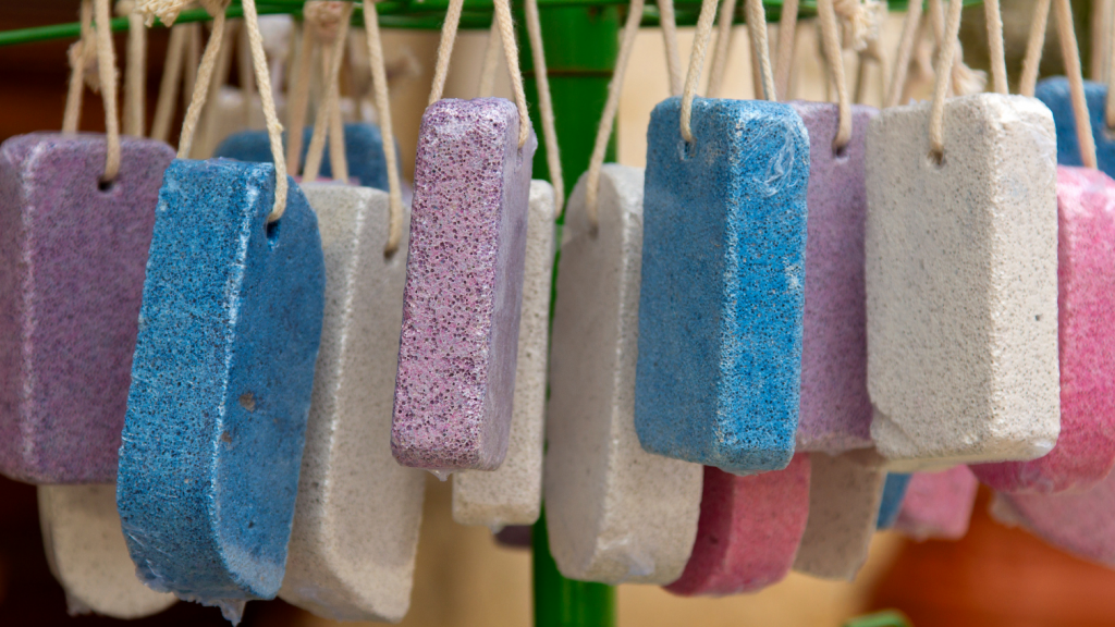 Multi-coloured pumice stones hanging together