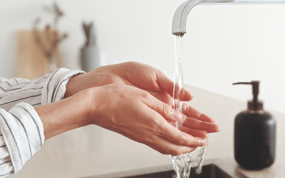 Washing hands at the sink