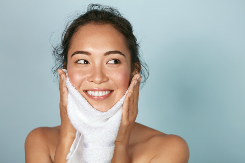 Woman,Cleaning,Facial,Skin,With,Towel,After,Washing,Face,Portrait.